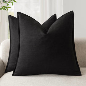 Foindtower flange linen pillow cover adds elegant texture to sofa.