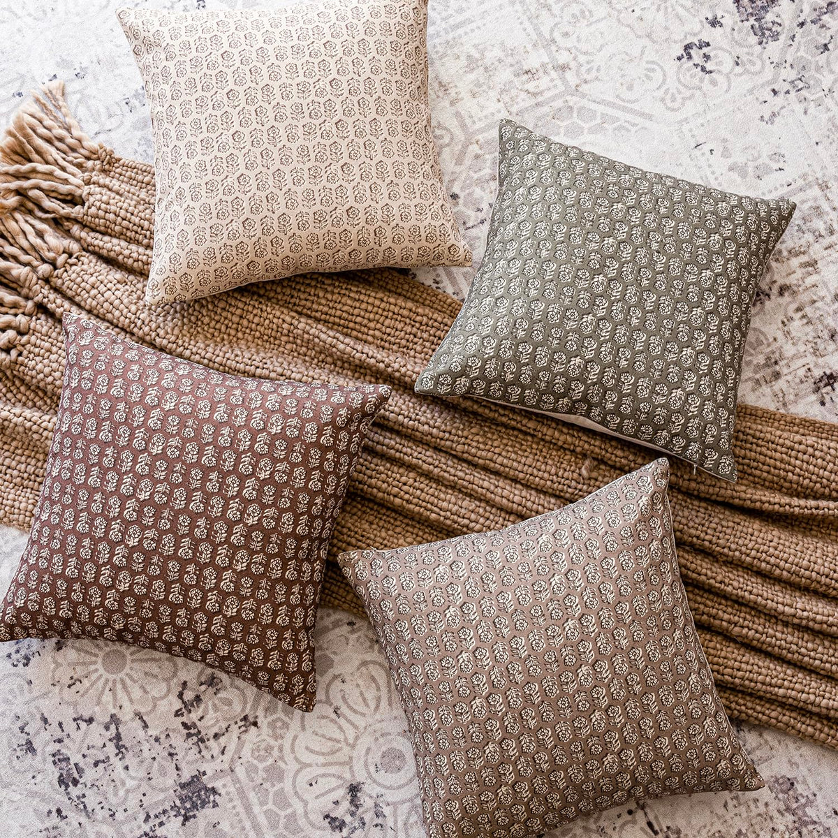 Foindtower pillow cover shown indoors and outdoors for versatile styling.