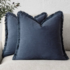 Foindtower navy fringe pillow cover enhances boho style on the living room sofa.