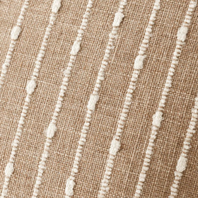 Two Foindtower camel pillow covers on a sofa for versatile decor.