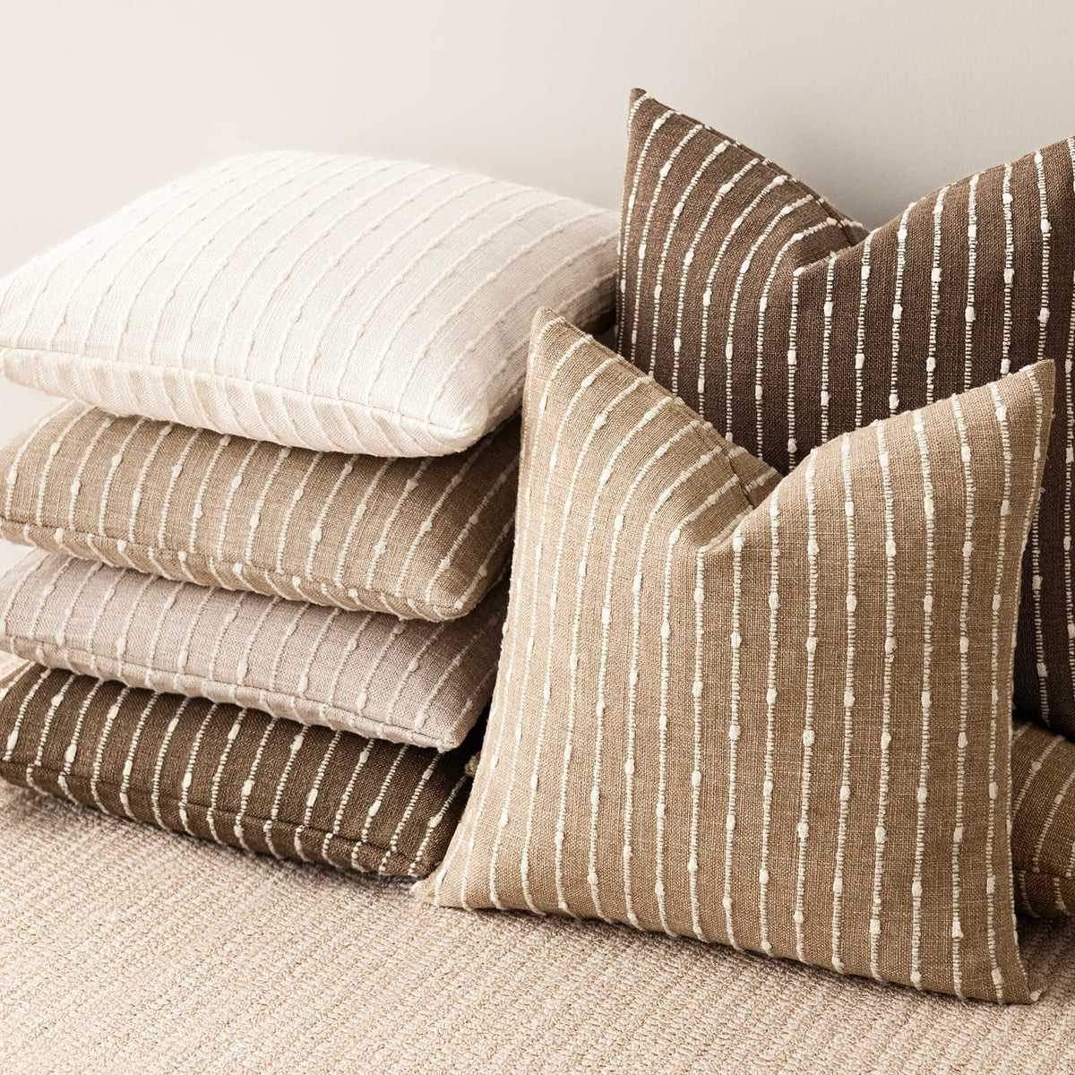 Foindtower decorative pillow cover in camel accentuates modern spaces.