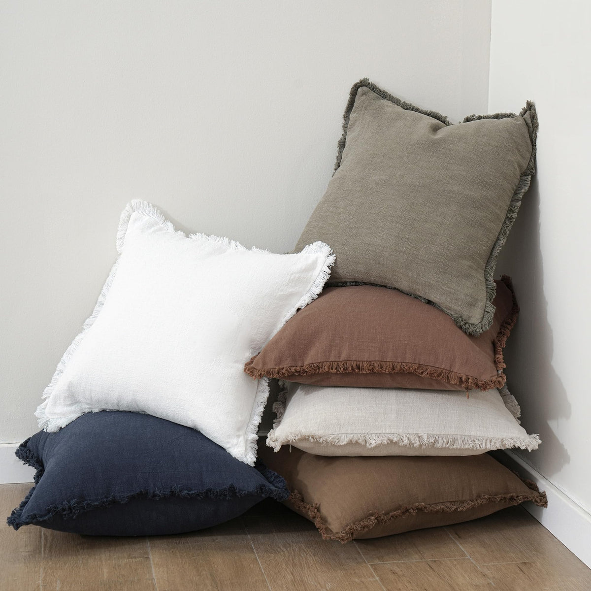 Foindtower pillow cover on sofa creates inviting, relaxed ambiance.