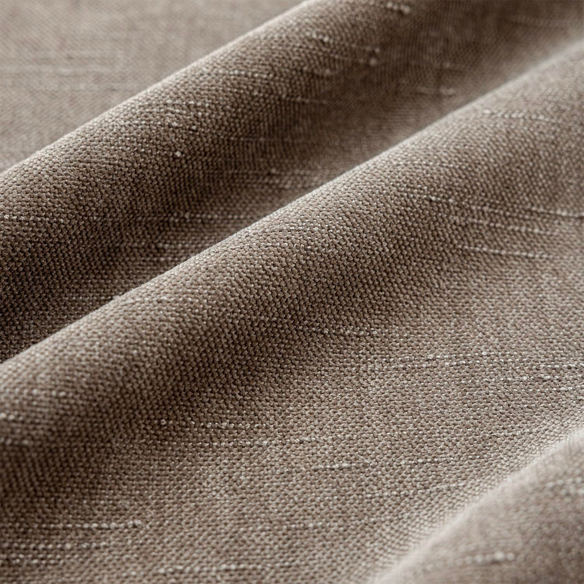 Foindtower slubby weave detail enhances style on decorative cushions.