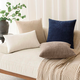 Foindtower square pillow cover with taupe shade brightens bedrooms and lounges.