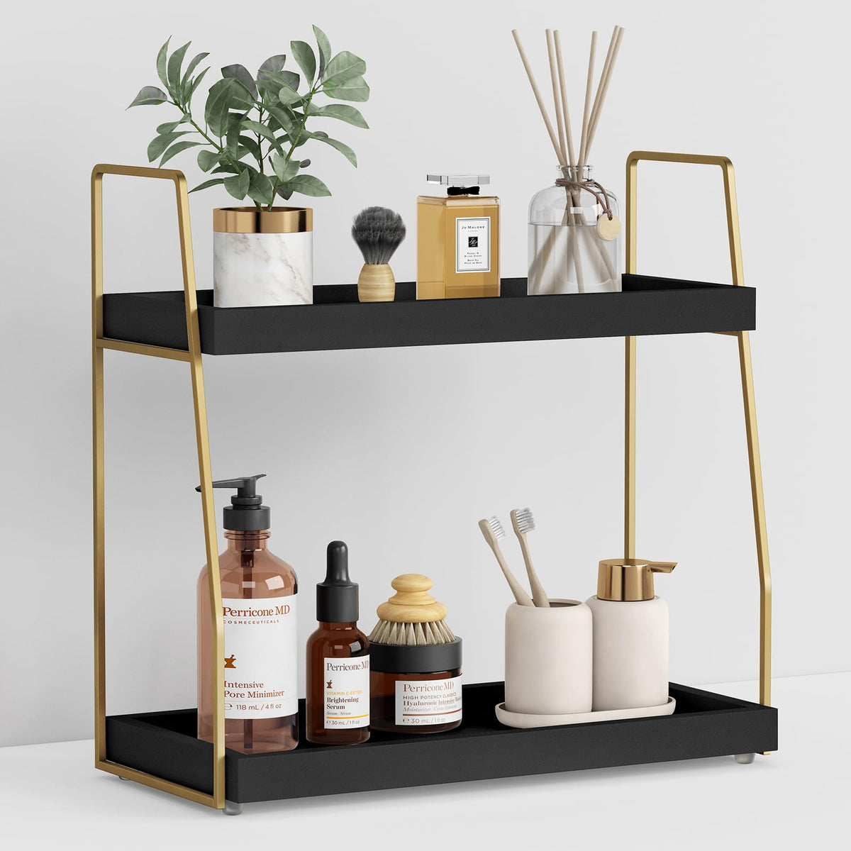 Forbena black and gold 2-tier organizer on a bathroom counter, neat toiletries.