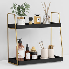 Forbena black and gold 2-tier organizer on a bathroom counter, neat toiletries.