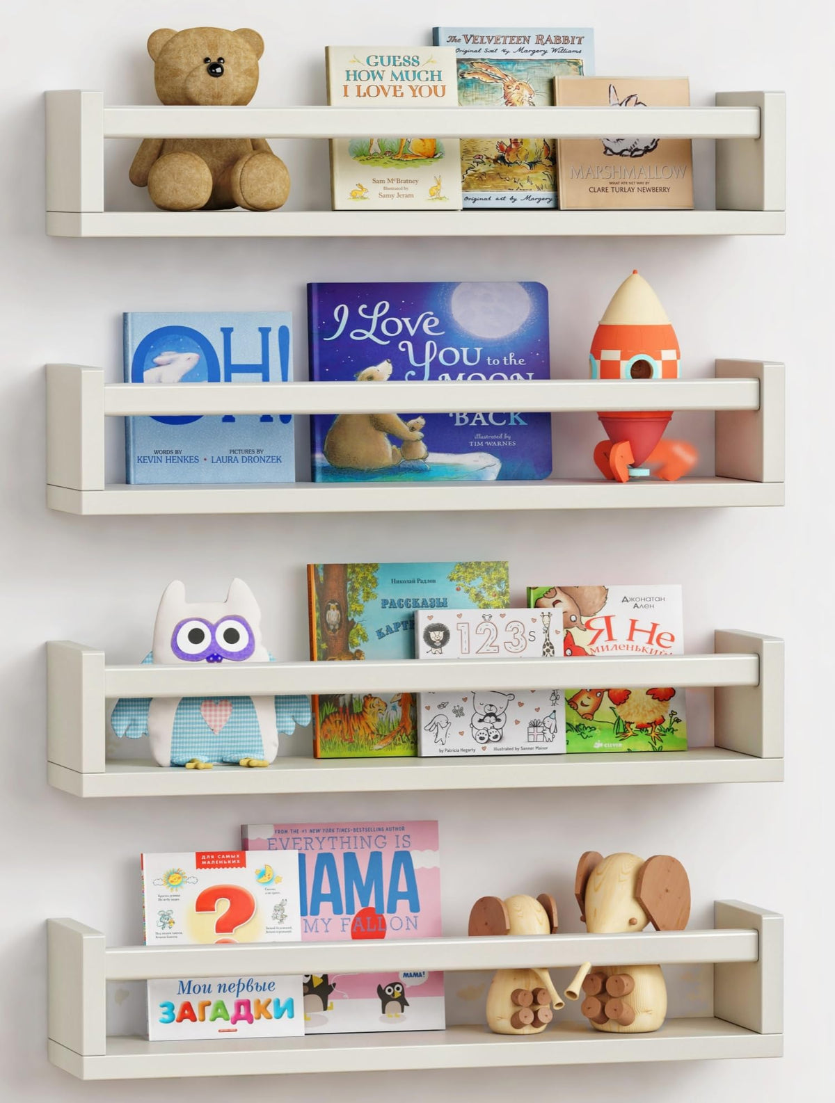 Forbena floating nursery shelves set four in white on wall holding books and toys neatly.