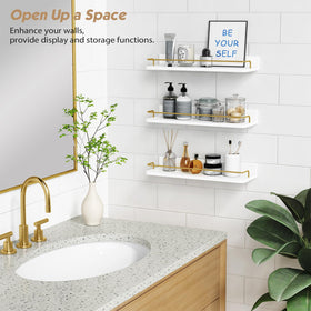 Forbena gold floating shelves in bathroom displaying skincare products.