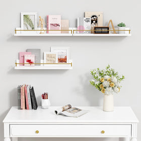 Forbena gold floating shelves in living room used for decorative display.