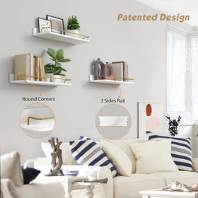 Forbena gold floating shelves close-up of white wood texture and gold finish.