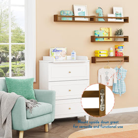 Forbena wall-mounted shelves shown in a cozy nursery setup.
