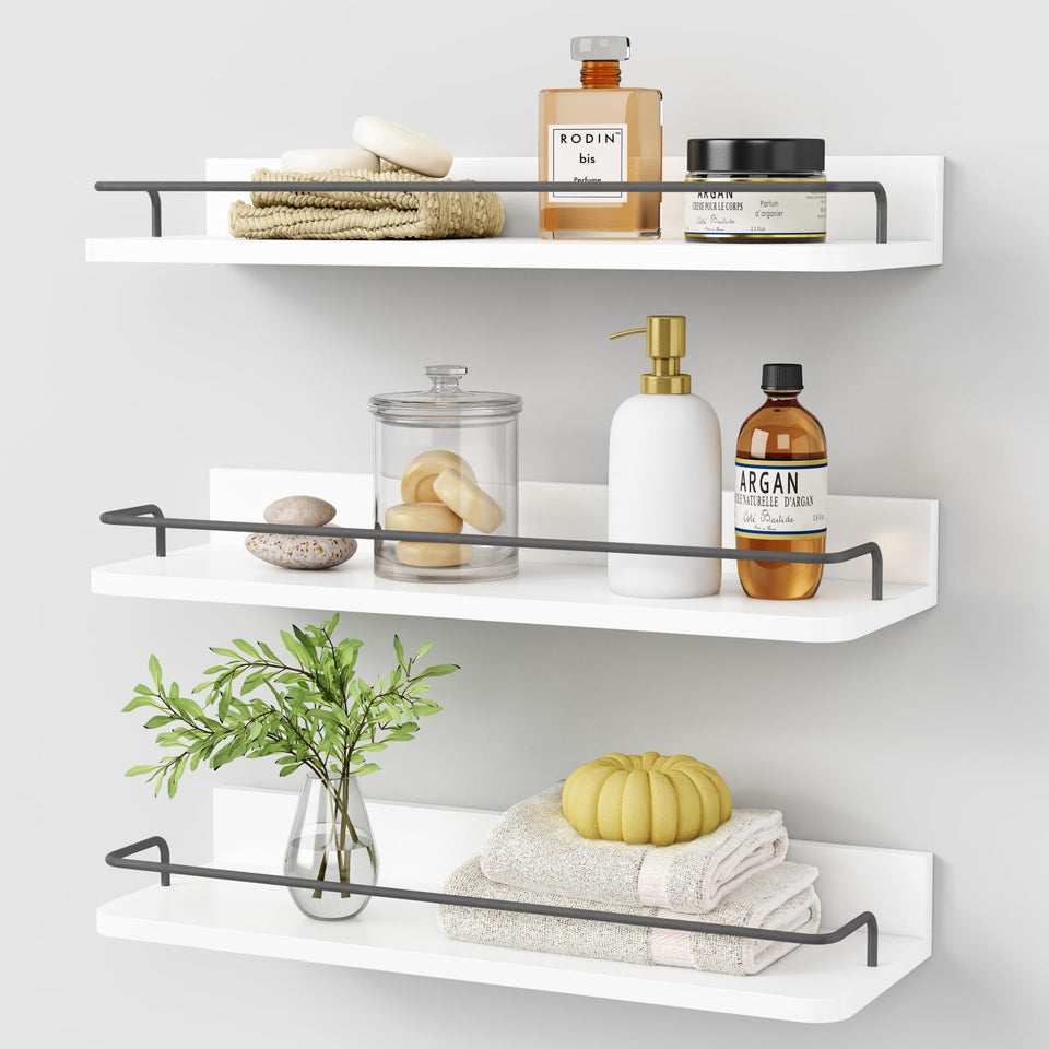 Forbena white floating shelves over the toilet offer compact storage.