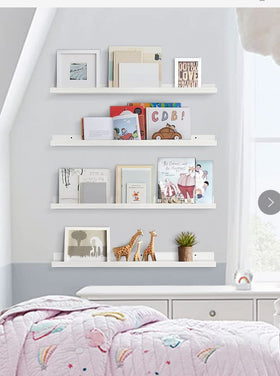 Forbena white solid wood shelving adds clean, durable storage.