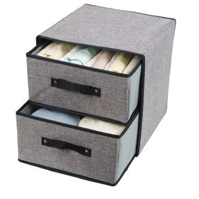 Decorative storage bin placed on a shelf for tidy organization.