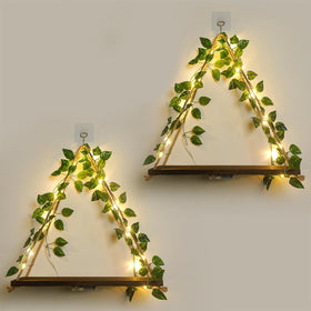 Forest Angle green leaf wall shelf showcases greenery while saving wall space for plants and decor.