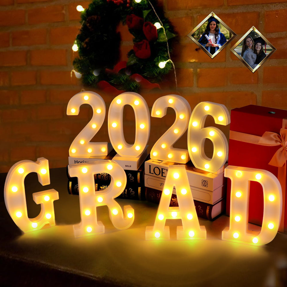 Forwe grad 2026 LED marquee letters illuminate the graduation stage