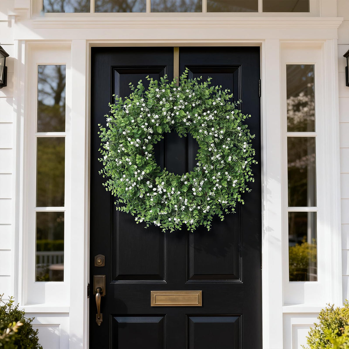 FOTEEWL white baby’s breath accents on a eucalyptus wreath ideal for porch display