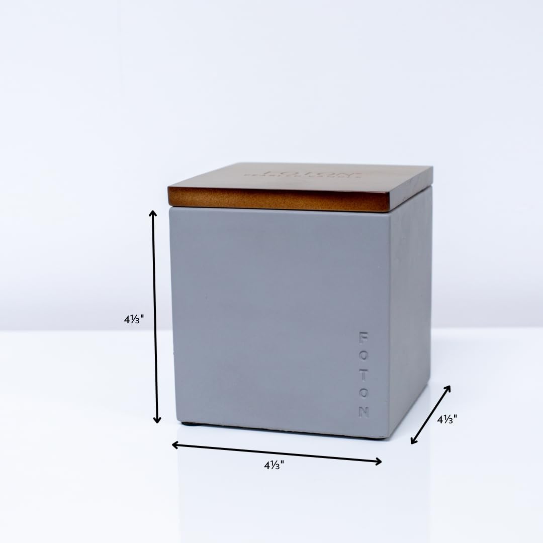 Foton modern concrete vase complements minimalist and contemporary interiors.