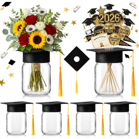 FOUGURTF graduation cap with hole for flowers on a sturdy glass centerpiece.