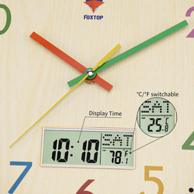 Foxtop LCD display showing time, day, and indoor temperature for quick reference.