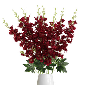 Fqueelvys delphinium artificial flowers in a tall vase adding lasting color
