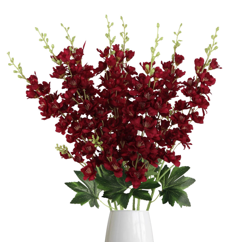 Fqueelvys delphinium artificial flowers in a tall vase adding lasting color