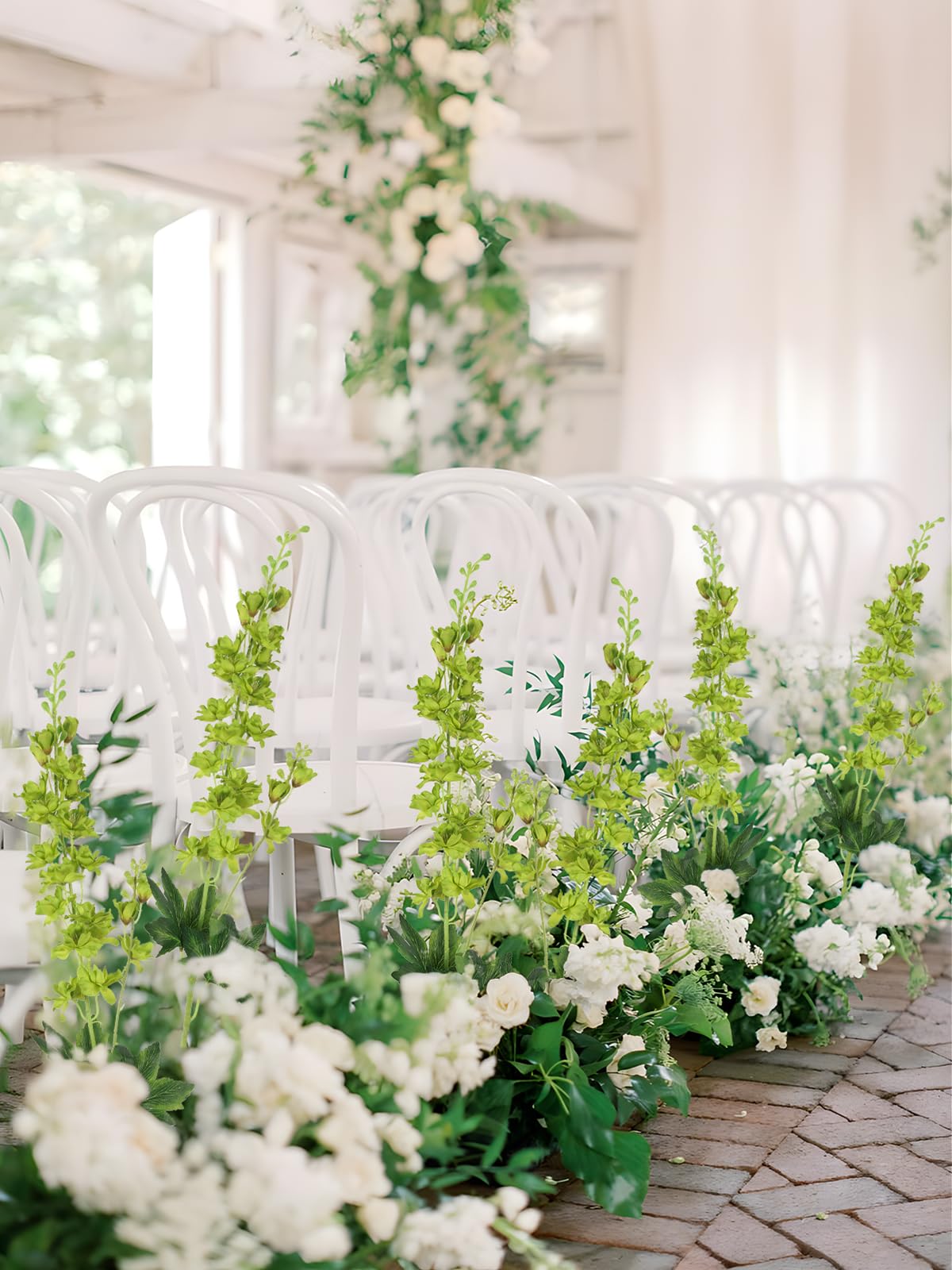 Fqueelvys delphinium vase display in a modern living room