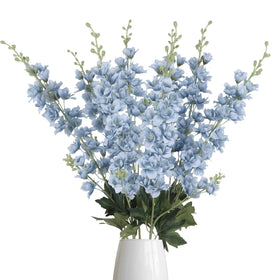 Fqueelvys dusty blue delphinium stems add elegant height to centerpieces.