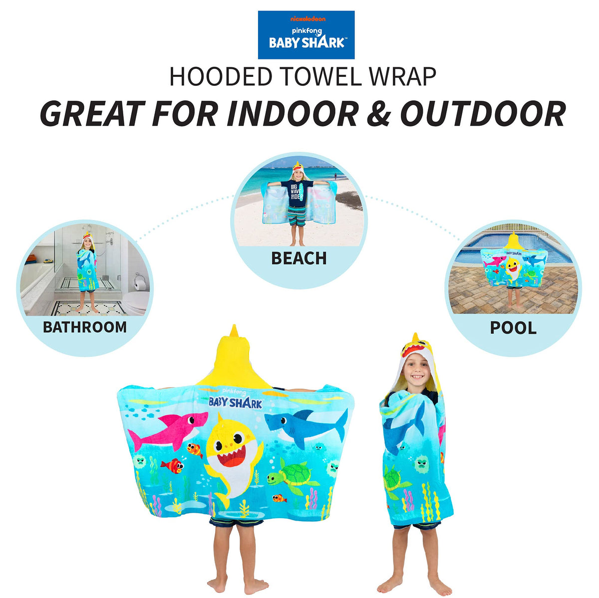 Franco Baby Shark hooded towel wrap on a sunny beach.