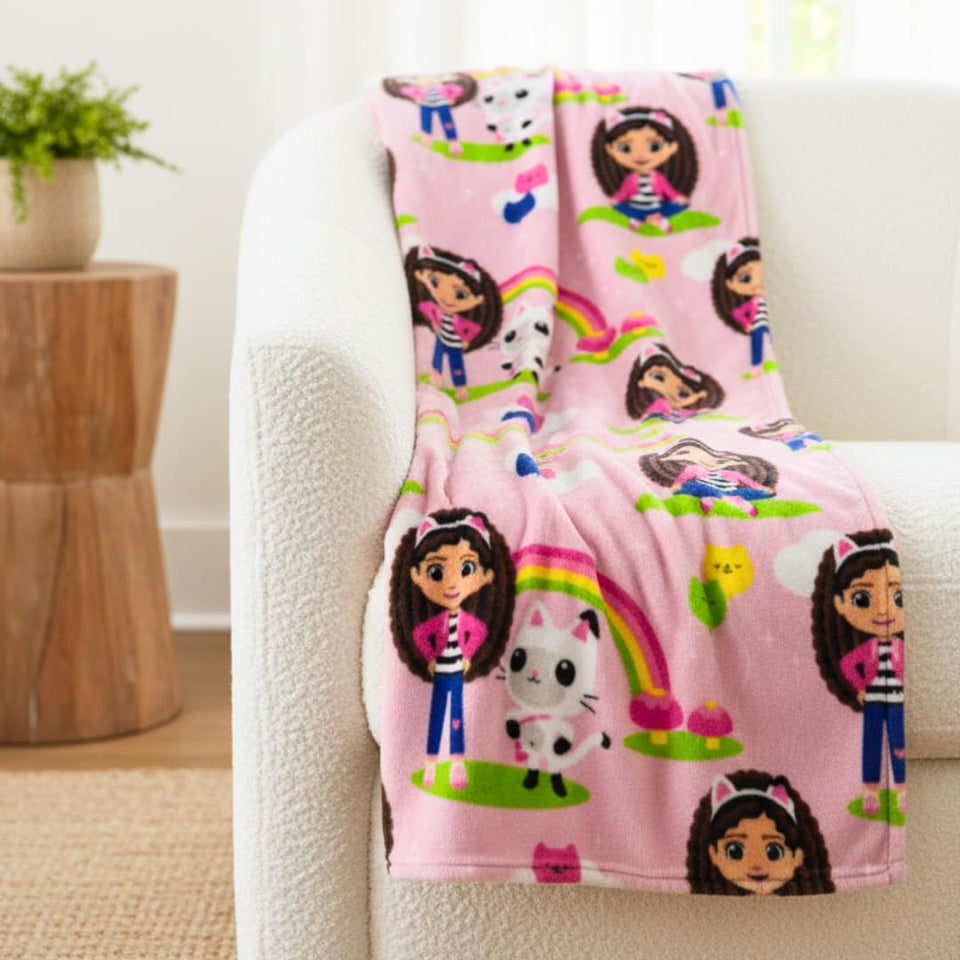 Franco Gabby's Dollhouse throw design close-up highlighting vibrant print for cozy playrooms.