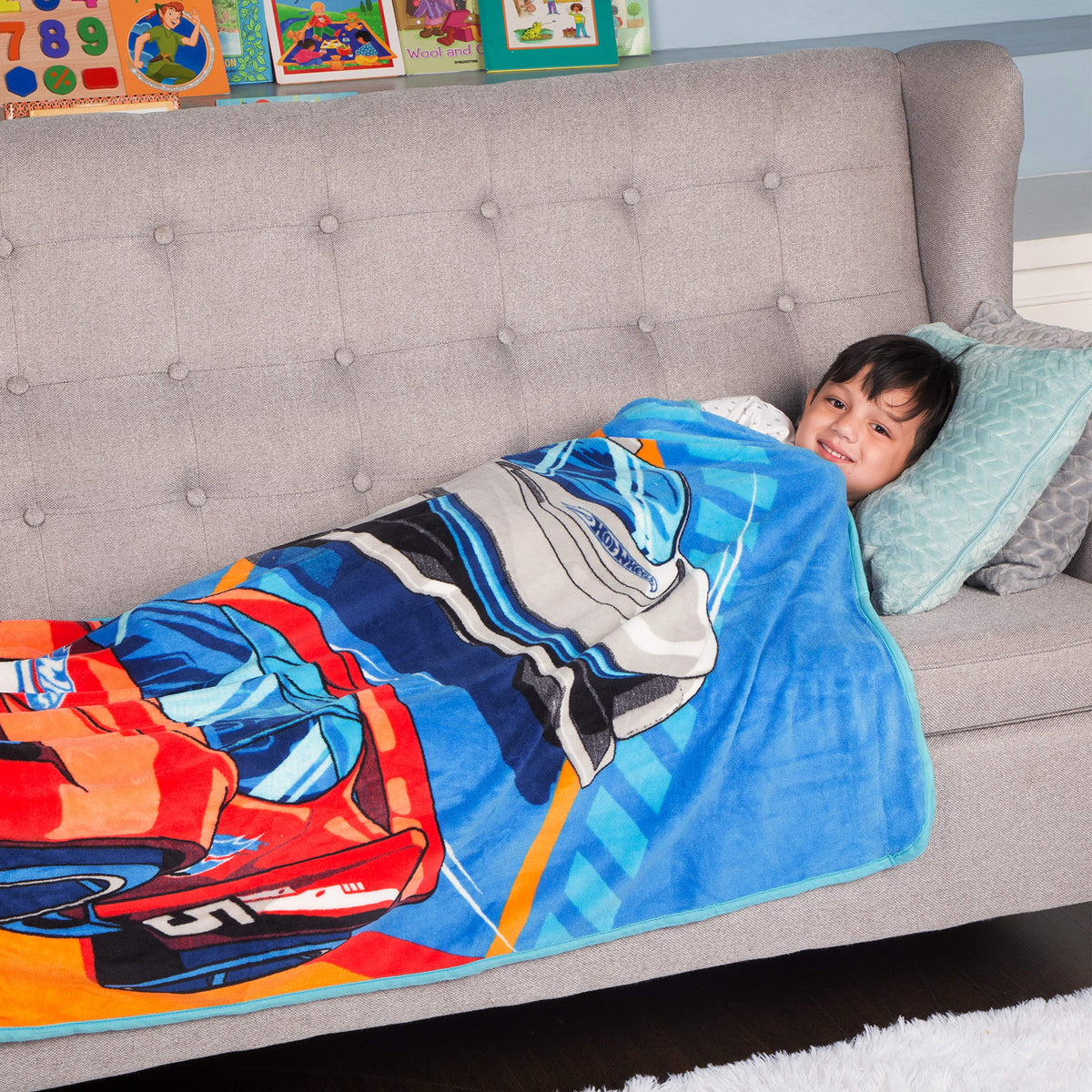 Franco Hot Wheels Speedster throw shown in a naptime setup.