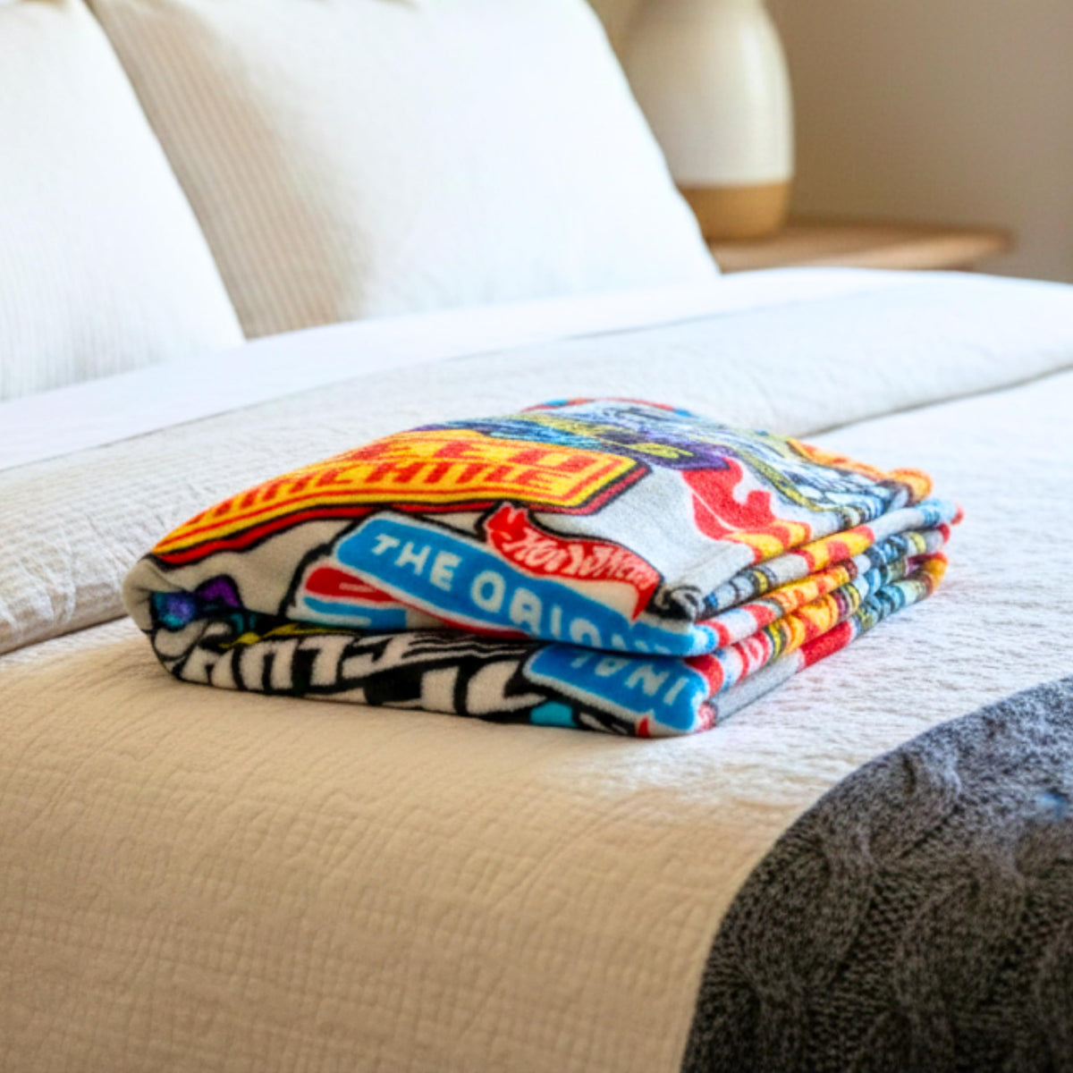 Franco Hot Wheels Throw draped on sofa for quick travel comfort