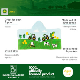 Franco John Deere towel features cows on a farm scene for cozy drying after swimming.