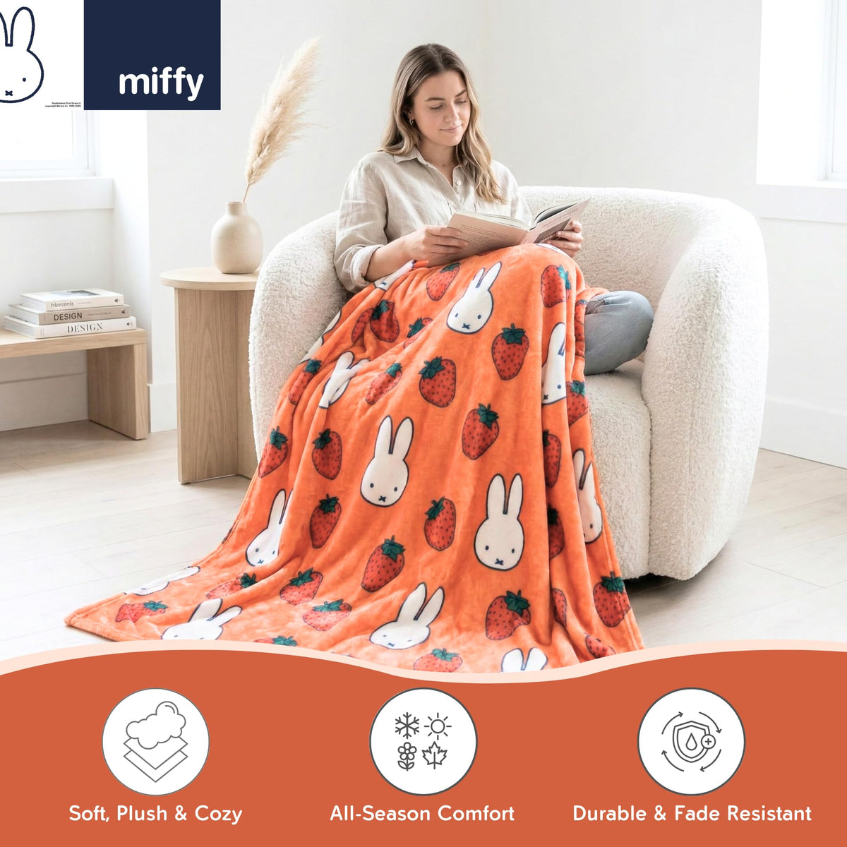 Franco Miffy throw on peach background enhances nursery decor with whimsy.