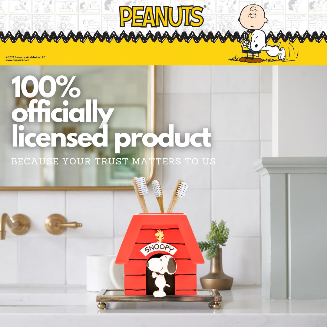 Franco Snoopy makeup brush holder arranged on vanity for tidy essentials.