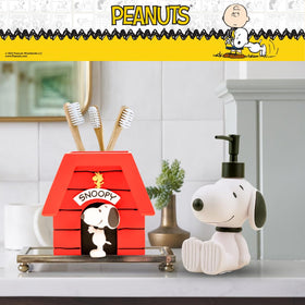 Franco Snoopy pen organizer on desk keeping small items orderly.