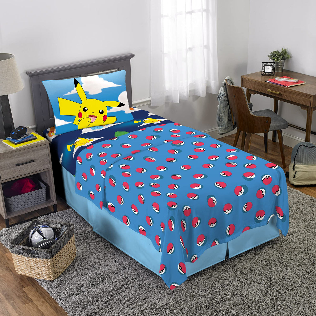 Franco Pokemon flat sheet with Pokeball design on bold blue backdrop for kid-friendly flair.