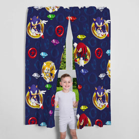 Franco Sonic curtains showcase dark blue backdrop with golden rings, great for themed bedrooms.