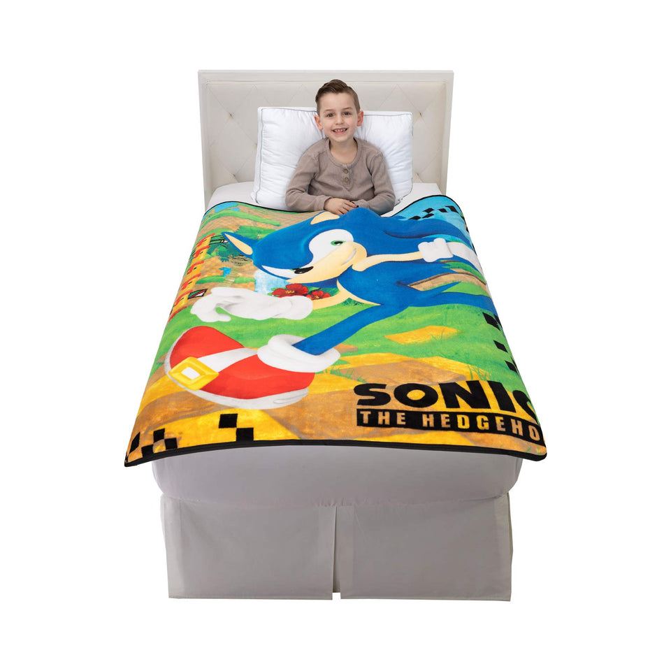 Franco Sonic Side Scroller throw with vibrant design for cozy naps