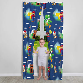 Franco Super Mario curtains with Mario characters brighten a child's bedroom while filtering light.