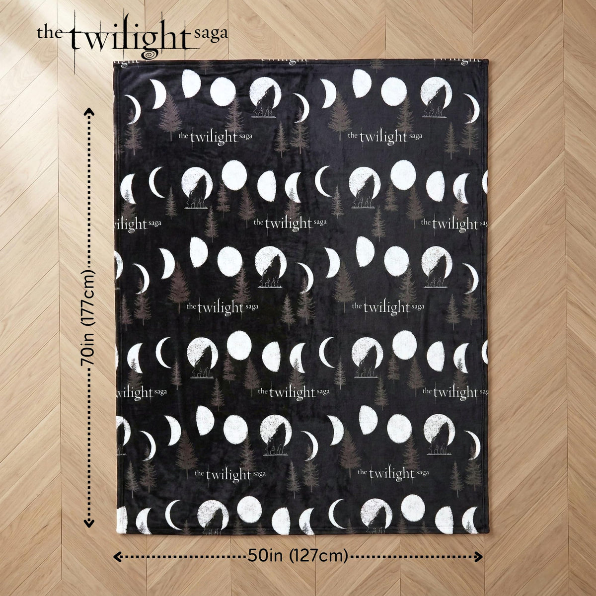 Franco Twilight Saga Throw on charcoal fabric emphasizes contrast and cozy warmth.