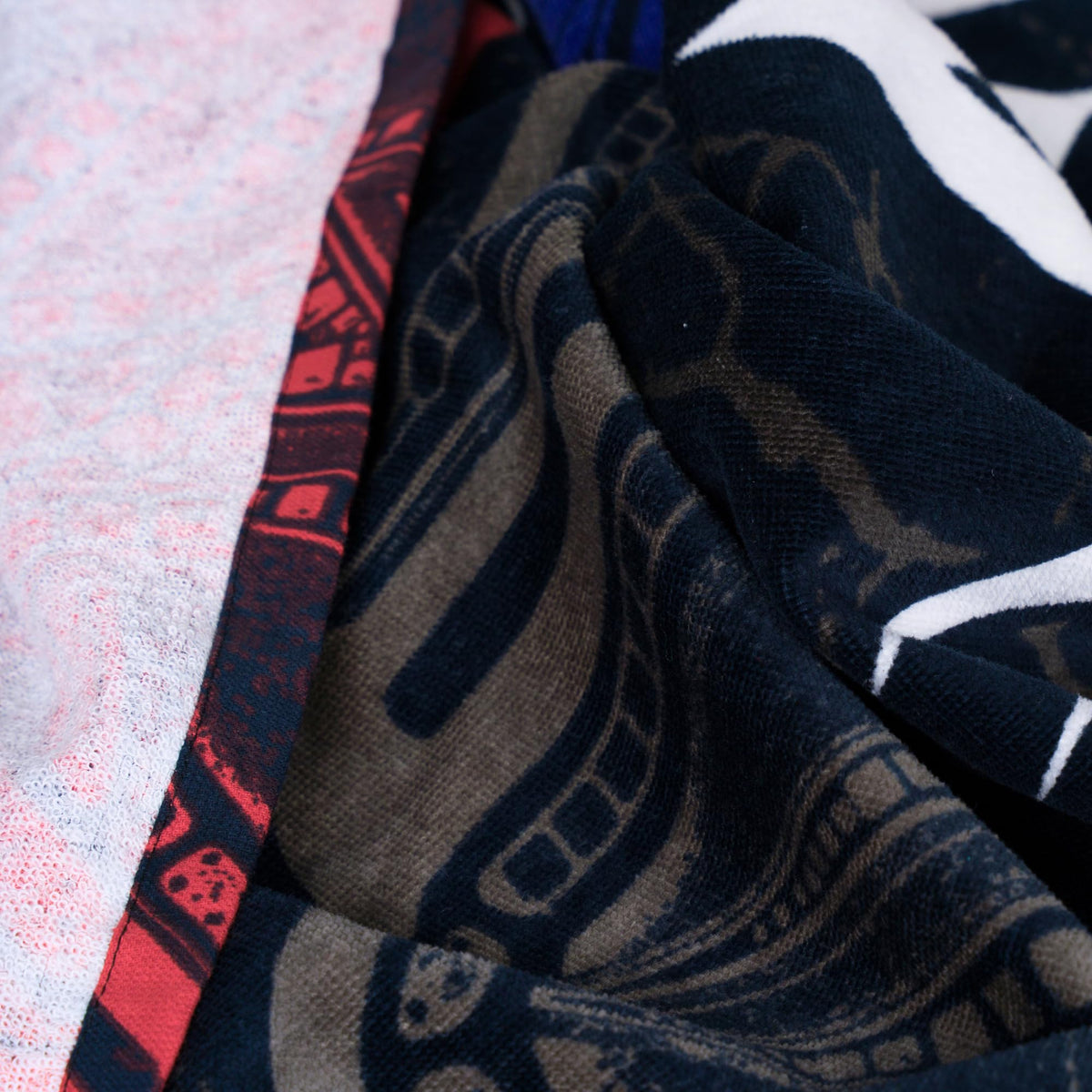Franco WWE towel at the beach signals collectable licensed gear.