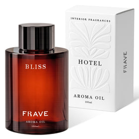 Frave Bliss diffuser oil 100ml bottle in a living room setting, hotel-inspired aroma.