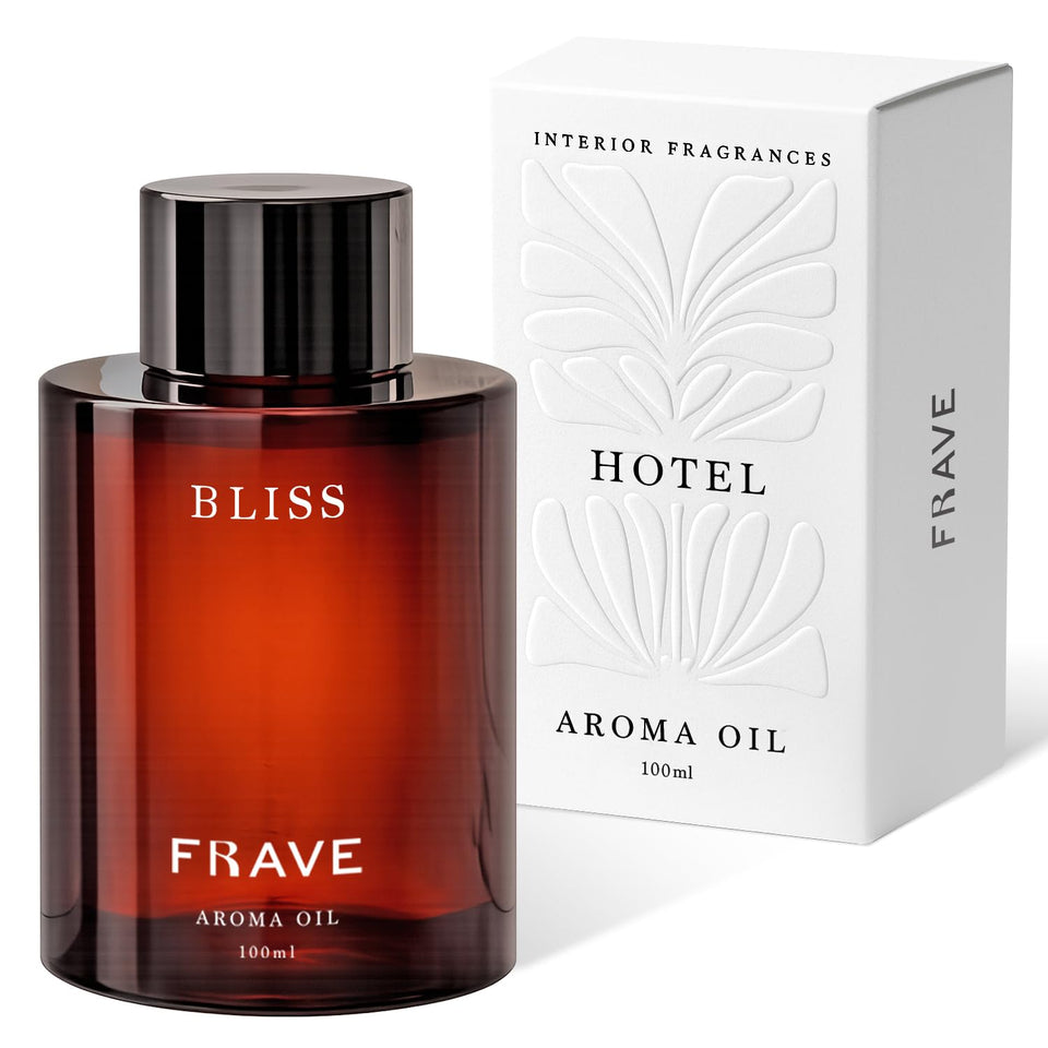Frave Bliss diffuser oil 100ml bottle in a living room setting, hotel-inspired aroma.