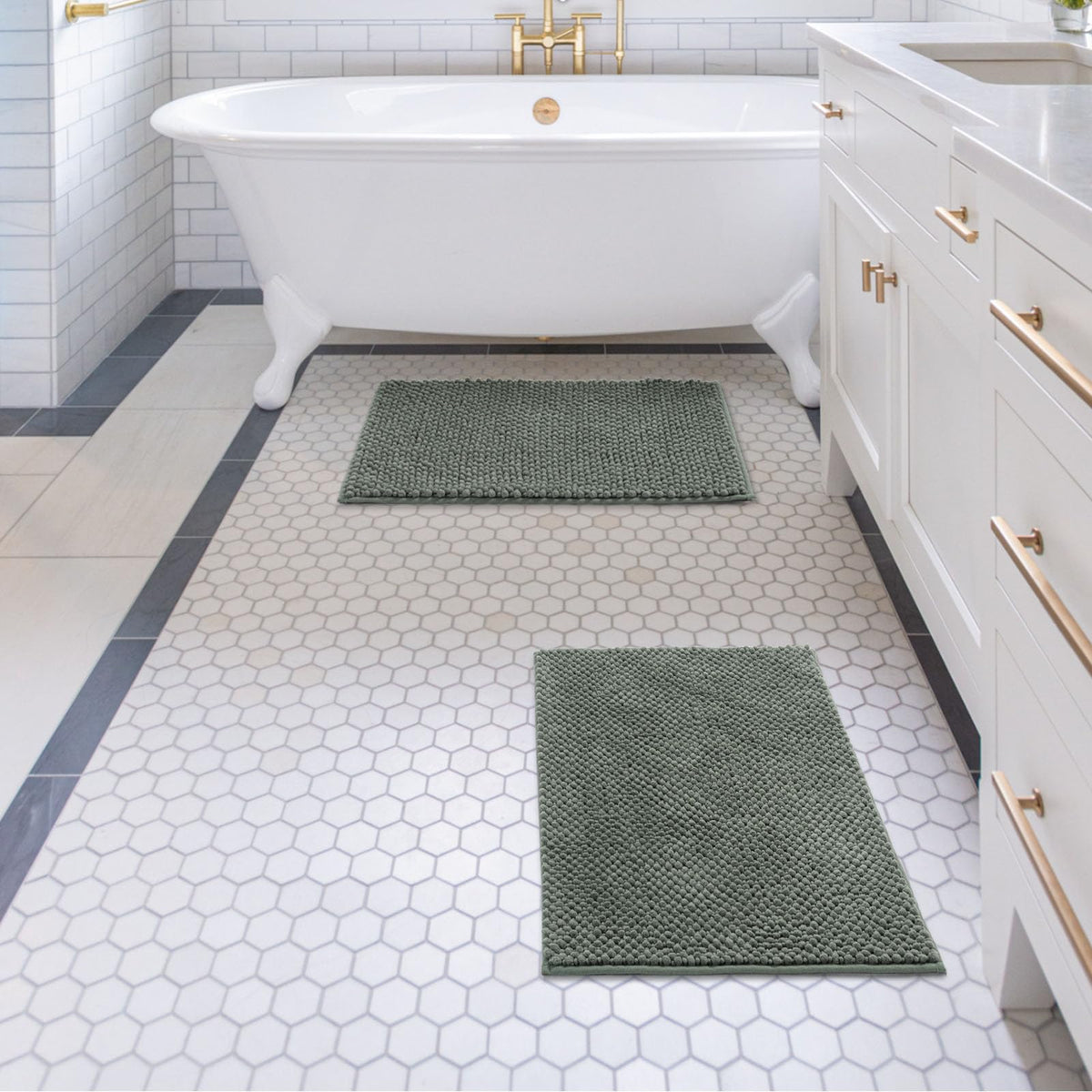 Sage green color complements modern bathroom decor.