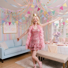 Frienda party setup wide-shot with pastel colors and glittering accents