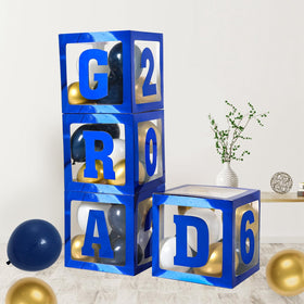 Frigg class of 2026 blue balloon boxes provide a photogenic graduation backdrop.