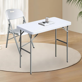 FROASISPRO folding table folded for easy storage and transport.
