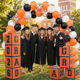 Froova black latex balloons provide contrast and depth to the setup.