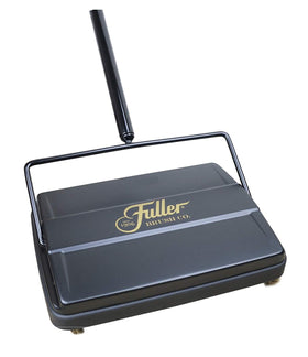 Fuller Brush 17027 sweeper on floor for quick mess cleanup.